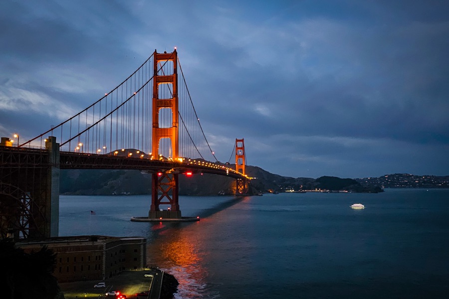 The Golden Gate Bridge lit up at dusk